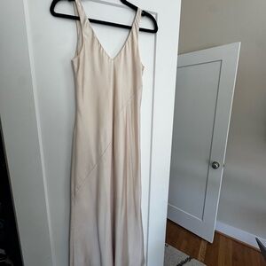 Elegant Silk Cream Sleeveless Dress
